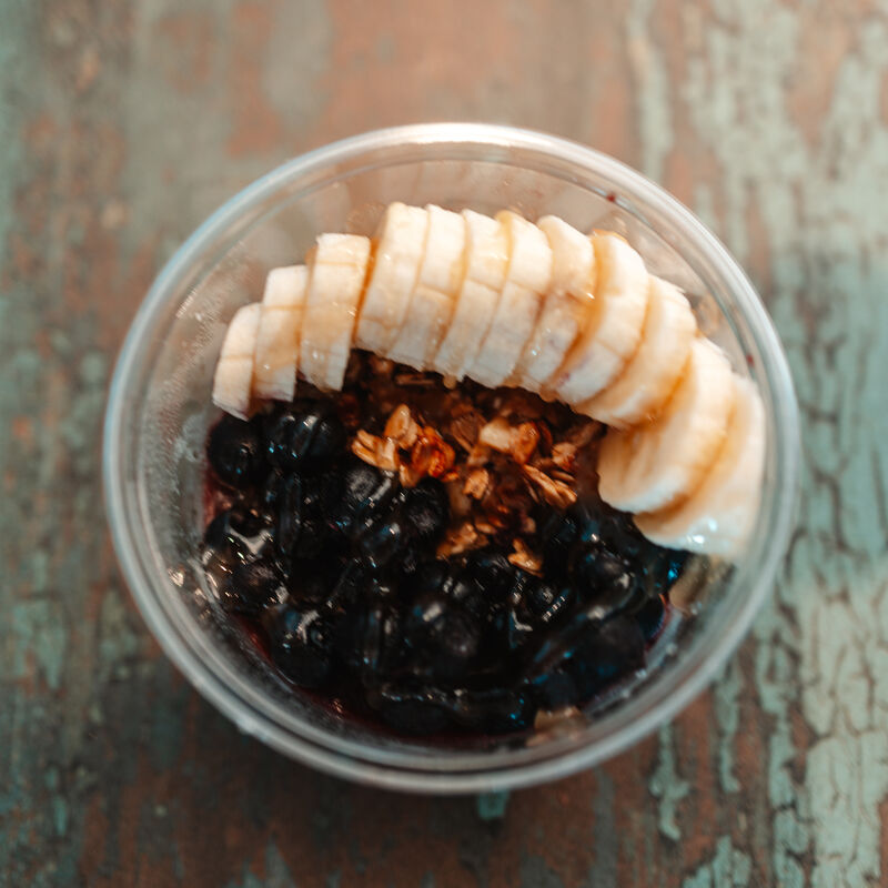 acai bowl with banana blueberries and granola